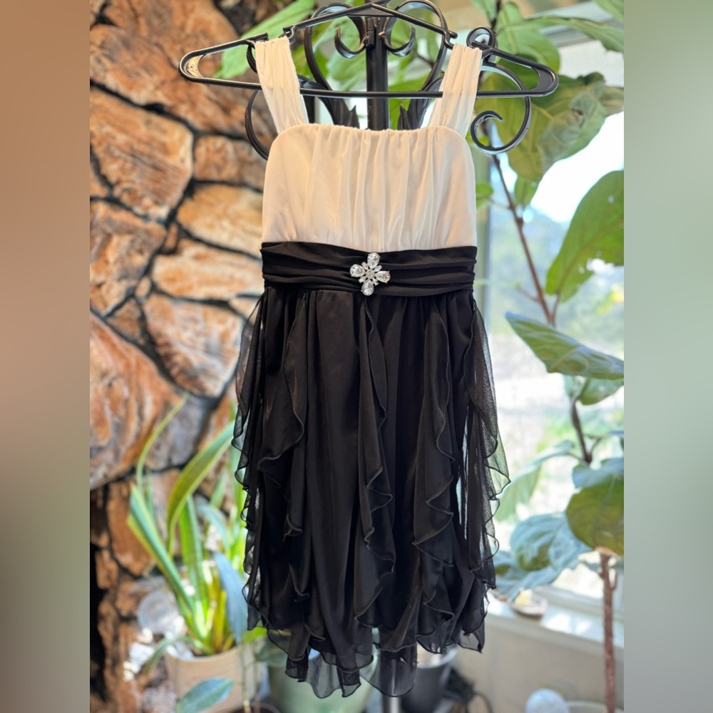 White and black girls dress size 10.